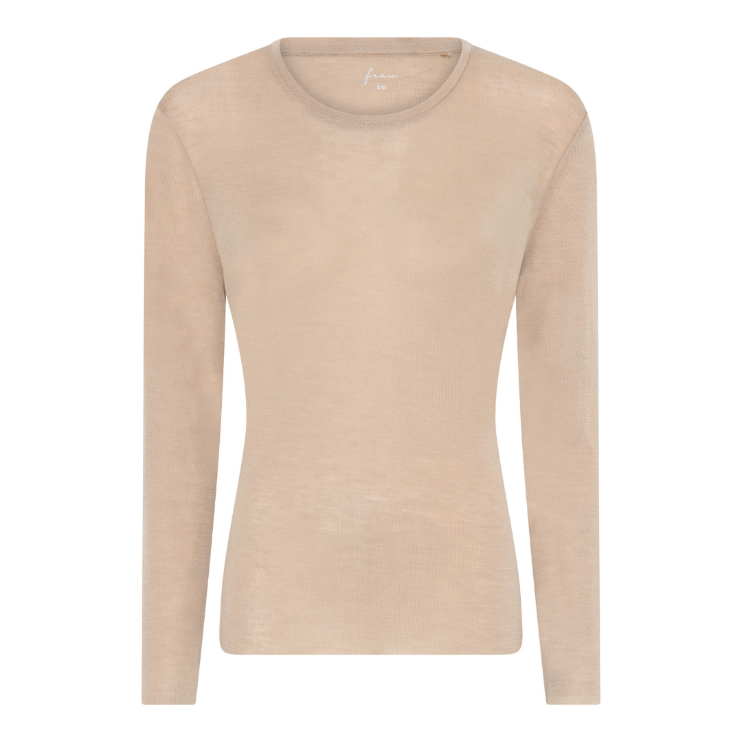 Panama blusen er en perfekt langærmet bluse og undetrøje i en lækker uld blanding med rund hals. Findes i 4 farver | Hurtig levering | fri fragt fra 149 kr.