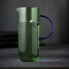 Køb Glaskande Torino 1,1 liter| 249,95 | Fri fragt over 149 kr. | Hurtig levering | Dag til dag levering | Lyngby Glas, Farvet glas, Farvet glaskande, Grønt glaskande, Pink glaskande, Blåt glaskande, Borddækning, Farverig glaskande, Kande