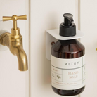 Køb Vægholder til sæbe- og shampoo flaske | Findes i flere farver | 59,95 | Fri fragt over 149 kr. | Hurtig levering | Dag til dag levering | Ib Laursen | Vægophæng, Sæbeholder, Vægbeslag, Holder til, Dispenser, Sæbepumpe, Sæbedispenser, Shampoo flaske, Shampoo flaske med pumpe, Flaske med pumpe, Plastik flaske m/pumpe