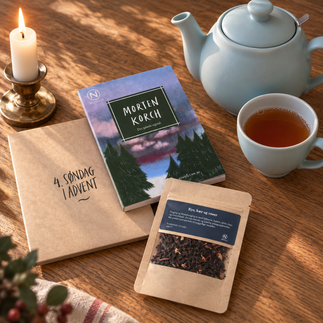 Adventskalender med kraft-kuvert, Morten Korch-novelle og tepose med løs te på træbord