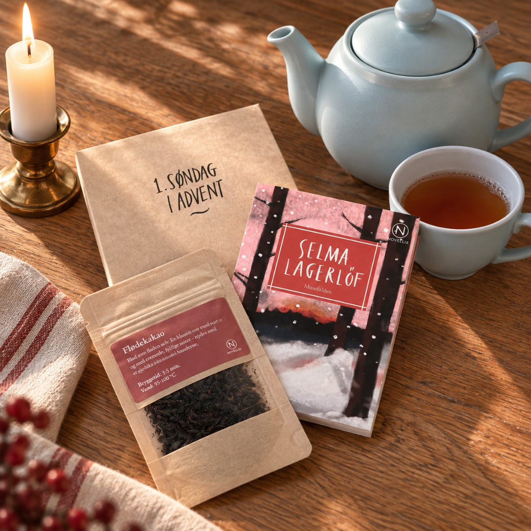 Adventskalender med brun kuvert mærket 1. søndag i advent, tepose med Flødekakao og novelhæfte af Selma Lagerlöf