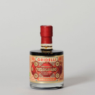 Gridelli balsamico eddike med granatæble i rund glasflaske med rød forsegling, 250 ml