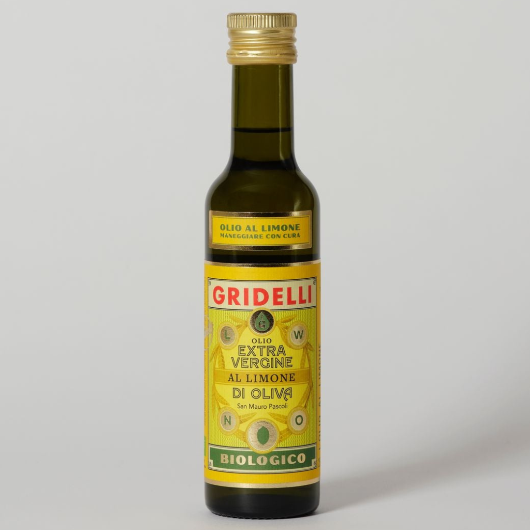 Gridelli økologisk ekstra jomfru olivenolie med citron i mørk glasflaske med gul etiket
