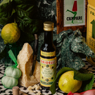 Gridelli Olio Al Limone økologisk olivenolie med citron i mørk glasflaske med grønt etiket
