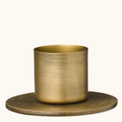 Cylindrisk lysestage i antik messing med flad rund fod