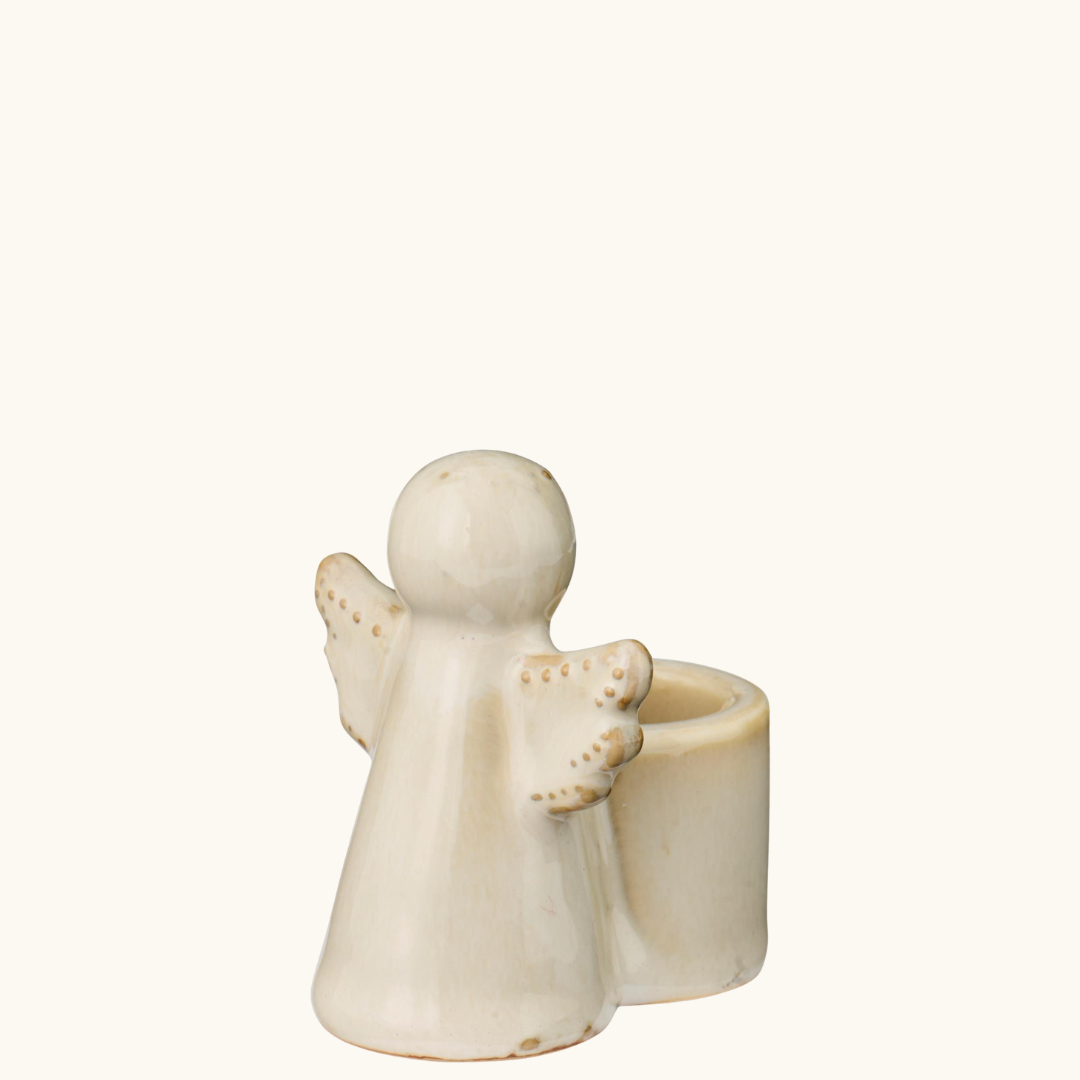 Creme keramikengel med cylindrisk lysestage og prikkede vinger