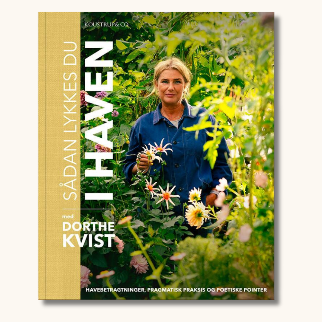 Indbundet bog med guldryg og titlen Sådan lykkes du i haven af Dorthe Kvist