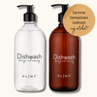 PLINT opvaskemiddel i plastflaske med sort pumpe og etiket med teksten 'Dishwash Orange & Rosemary