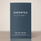 Supertea Earl Grey Organic teæske i mørk blågrå med hvid tekst og brailleskrift, 20 tebreve