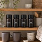 Fire mørkebrune Teministeriet Ayurveda urtete-krukker med sort låg: Recover, Sleep, Tummy og Relax